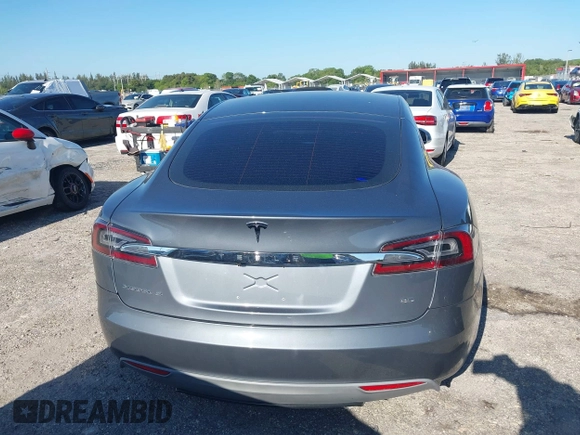 2014 Tesla Model S 60 with VIN 5YJSA1H1XEFP31911, listed as a IAAI auction lot 42029215 with Not Provided miles and . Bid and sale history available at DreamBid. Image 16.