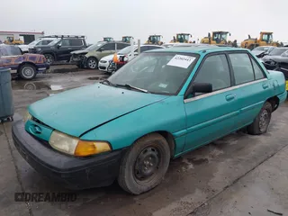 1994 Ford Escort z VIN 3FARP13J0RR121191, wystawiony jako IAAI lot #42202443 z przebiegiem 111 111 mil mil oraz . Historia ofert i sprzedaży dostępna na DreamBid. Obrazek 2.