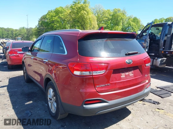 2017 Kia Sorento LX z VIN 5XYPG4A3XHG295107, wystawiony jako IAAI lot #42037114 z przebiegiem 91 967 mil mil oraz . Historia ofert i sprzedaży dostępna na DreamBid. Obrazek 3.