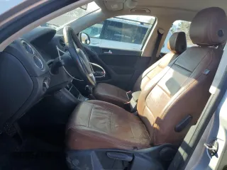 2014 Volkswagen Tiguan SE z VIN WVGAV3AX9EW563907, wystawiony jako Copart lot #45157495 z przebiegiem 100 174 mil mil oraz Szkoda całkowita • Salvage title. Historia ofert i sprzedaży dostępna na DreamBid. Obrazek 7.