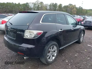 2009 Mazda CX-7 Sport with VIN JM3ER293490233789, listed as a IAAI auction lot 41853327 with 213,164 mi miles. Bid and sale history available at carsss.com. Image 4.