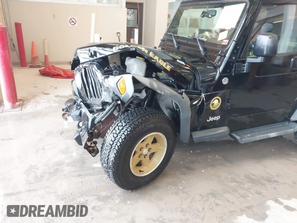 2006 Jeep Wrangler Sport with VIN 1J4FA49S96P733712, listed as a IAAI auction lot 41572913 with 93,511 mi miles. Bid and sale history available at carsss.com. Image 6.