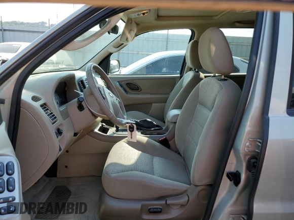 2005 Ford Escape XLT with VIN 1FMYU03115KA43989, listed as a Copart auction lot 69295484 with 160,309 mi miles and Salvage Title. Bid and sale history available at carsss.com. Image 7.