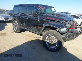 2020 Jeep Wrangler Unlimited Rubicon с VIN 1C4HJXFG6LW125521, выставлен на аукционе IAAI как лот 41623946 с пробегом 38 547 миль миль и . История ставок и продаж доступна на DreamBid. Изображение 1.