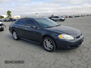 2014 Chevrolet Impala LTZ with VIN 2G1WC5E35E1106319, listed as a Copart auction lot 59260365 with 139,722 mi miles and Salvage title. Bid and sale history available at DreamBid. Image 4.