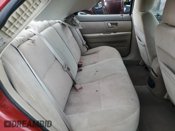 2000 Ford Taurus SES with VIN 1FAFP55U1YA262488, listed as a Copart auction lot 52312645 with 128,621 mi miles and Salvage Title. Bid and sale history available at DreamBid. Image 10.