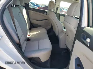 2018 Hyundai Tucson SEL z VIN KM8J33A41JU656096, wystawiony jako Copart lot #47367835 z przebiegiem 96 498 mil mil oraz Szkoda całkowita • Salvage title. Historia ofert i sprzedaży dostępna na DreamBid. Obrazek 10.