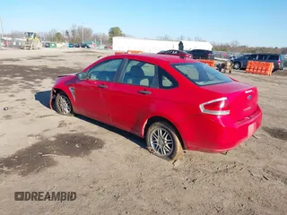 2008 Ford Focus SE with VIN 1FAHP35N18W272267, listed as a IAAI auction lot 41003854 with 239,062 mi miles. Bid and sale history available at carsss.com. Image 3.