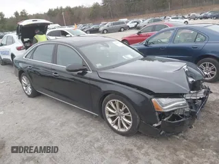 2011 Audi A8 z VIN WAURVAFDXBN026102, wystawiony jako IAAI lot #39096660 z przebiegiem 151 060 mil mil oraz . Historia ofert i sprzedaży dostępna na DreamBid. Obrazek 1.