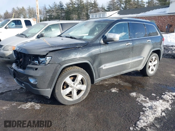 2013 Jeep Grand Cherokee Overland with VIN 1C4RJFCT3DC636378, listed as a IAAI auction lot 41477415 with 147,651 mi miles. Bid and sale history available at carsss.com. Image 17.