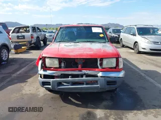2000 Nissan Frontier XE z VIN 1N6DD21SXYC366427, wystawiony jako IAAI lot #42111404 z przebiegiem 176 579 mil mil oraz . Historia ofert i sprzedaży dostępna na DreamBid. Obrazek 13.