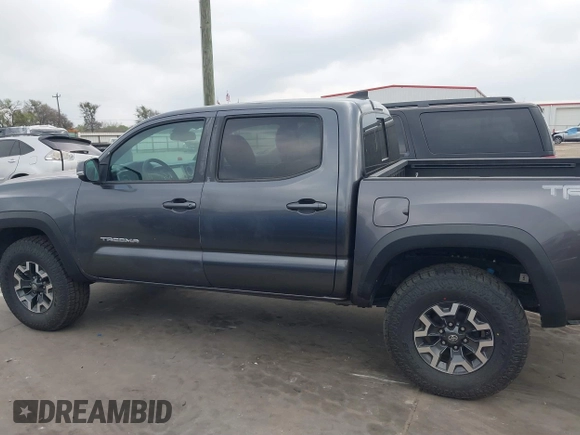 2018 Toyota Tacoma SR with VIN 5TFCZ5AN6JX127774, listed as a IAAI auction lot 41801158 with 28,161 mi miles and . Bid and sale history available at DreamBid. Image 14.