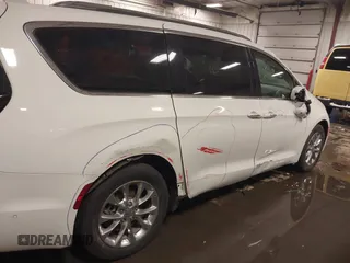 2021 Chrysler Pacifica Touring L with VIN 2C4RC1BG3MR504293, listed as a IAAI auction lot 41728608 with 70,487 mi miles and . Bid and sale history available at DreamBid. Image 19.
