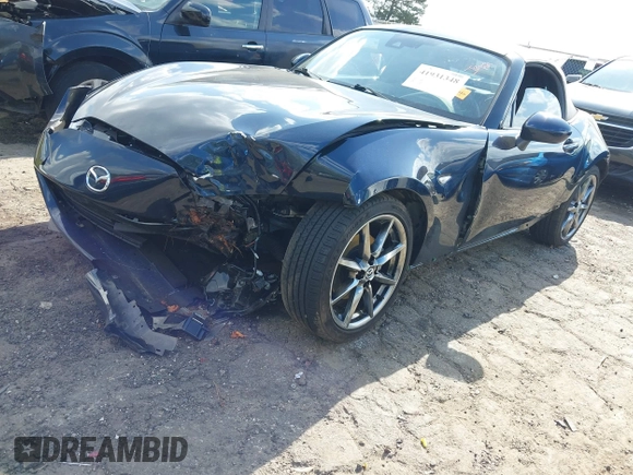 2021 Mazda MX-5 Miata Grand Touring с VIN JM1NDAD79M0457032, выставлен на аукционе IAAI как лот 41931348 с пробегом 47 874 миль миль и . История ставок и продаж доступна на DreamBid. Изображение 17.