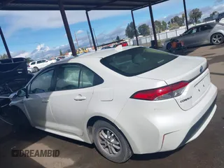 2021 Toyota Corolla Hybrid LE with VIN JTDEAMDE7MJ012694, listed as a IAAI auction lot 41794233 with 103,363 mi miles. Bid and sale history available at carsss.com. Image 15.