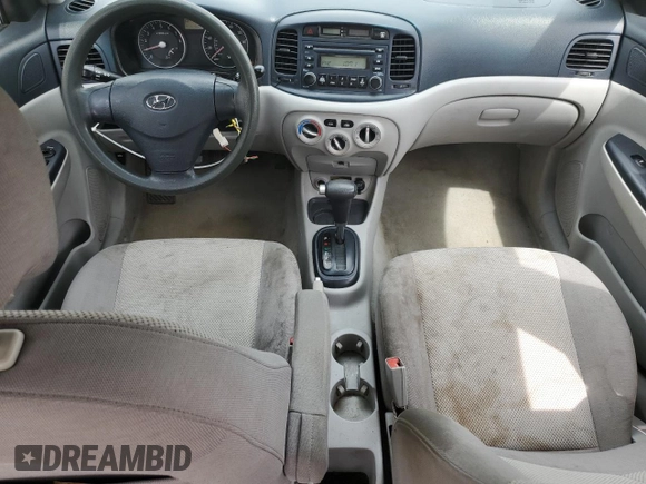 2006 Hyundai Accent GLS with VIN KMHCN46C46U048752, listed as a Copart auction lot 52930035 with 143,688 mi miles and Salvage title. Bid and sale history available at DreamBid. Image 8.