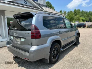 2004 Lexus GX 470 z VIN JTJBT20X940060144, wystawiony jako Copart lot #60893715 z przebiegiem 303 468 mil mil oraz Czysty tytuł • Clean title. Historia ofert i sprzedaży dostępna na DreamBid. Obrazek 4.