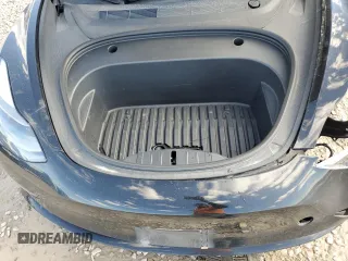 2023 Tesla Model 3 with VIN 5YJ3E1EAXPF708001, listed as a Copart auction lot 57252735 with 71,579 mi miles and Salvage title. Bid and sale history available at DreamBid. Image 11.