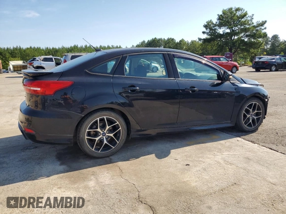 2016 Ford Focus SE z VIN 1FADP3F2XGL261707, wystawiony jako Copart lot #59078565 z przebiegiem 79 820 mil mil oraz Szkoda całkowita • Salvage title. Historia ofert i sprzedaży dostępna na DreamBid. Obrazek 3.