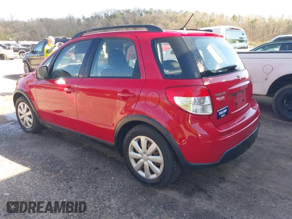 2010 Suzuki SX4 with VIN JS2YB5A34A6301801, listed as a IAAI auction lot 41884838 with 124,381 mi miles. Bid and sale history available at carsss.com. Image 3.