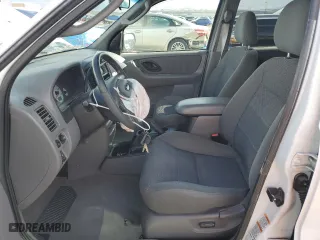 2002 Ford Escape Limited with VIN 1FMCU04152KA63778, listed as a Copart auction lot 51471585 with 103,803 mi miles and Salvage Title. Bid and sale history available at carsss.com. Image 7.
