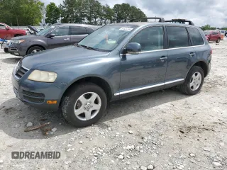 2005 Volkswagen Touareg z VIN WVGZG77LX5D082522, wystawiony jako Copart lot #54824744 z przebiegiem 156 354 mil mil oraz Nie do naprawy • Non repairable. Historia ofert i sprzedaży dostępna na DreamBid. Obrazek 1.