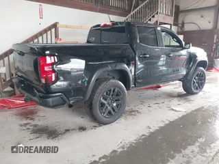 2023 Chevrolet Colorado 4WD Trail Boss with VIN 1GCPTEEK3P1261771, listed as a IAAI auction lot 42535710 with 30,000 mi miles and . Bid and sale history available at DreamBid. Image 4.