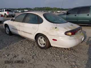 1997 Ford Taurus GL z VIN 1FALP52UXVA107778, wystawiony jako IAAI lot #42069491 z przebiegiem 57 736 mil mil oraz . Historia ofert i sprzedaży dostępna na DreamBid. Obrazek 3.