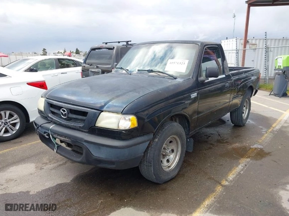 2003 Mazda B-Series 2WD Truck SX with VIN 4F4YR12D23TM09609, listed as a IAAI auction lot 41571323 with 194,860 mi miles. Bid and sale history available at carsss.com. Image 2.