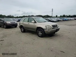 1999 Lexus RX 300 Luxury SUV with VIN JT6HF10U7X0007085, listed as a Copart auction lot 73497214 with 305,185 mi miles and Salvage Title. Bid and sale history available at carsss.com. Image 11.