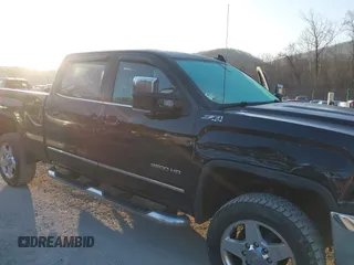 2015 GMC Sierra 2500HD available WiFi SLT with VIN 1GT12ZEG7FF606328, listed as a IAAI auction lot 41793799 with 94,107 mi miles. Bid and sale history available at carsss.com. Image 6.