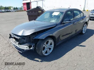2012 BMW 3 Series 335i with VIN WBA3A9C5XCF077642, listed as a IAAI auction lot 42385611 with 119,251 mi miles and . Bid and sale history available at DreamBid. Image 2.