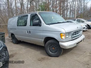 2001 Ford Econoline Cargo with VIN 1FTRE14281HA44065, listed as a IAAI auction lot 41828491 with 116,086 mi miles. Bid and sale history available at carsss.com. Image 1.