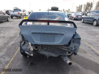 2004 Mitsubishi Lancer ES with VIN JA3AJ26E54U054570, listed as a IAAI auction lot 41592397 with 220,140 mi miles. Bid and sale history available at carsss.com. Image 16.