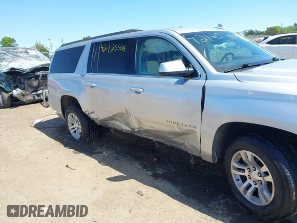 2017 Chevrolet Suburban LT z VIN 1GNSKHKC9HR268651, wystawiony jako IAAI lot #42125406 z przebiegiem 174 451 mil mil oraz . Historia ofert i sprzedaży dostępna na DreamBid. Obrazek 6.