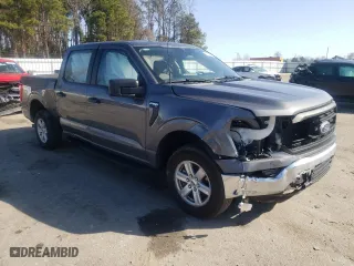 2023 Ford F-150 XL with VIN 1FTEW1CB1PKG04498, listed as a Copart auction lot 43714565 with 21,842 mi miles and Salvage Title. Bid and sale history available at carsss.com. Image 4.