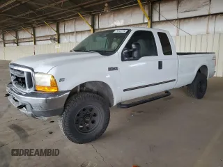 2000 Ford Super Duty F-250 XL with VIN 1FTNX21S9YED03242, listed as a Copart auction lot 74542704 with 218,739 mi miles and Salvage Title. Bid and sale history available at carsss.com. Image 1.