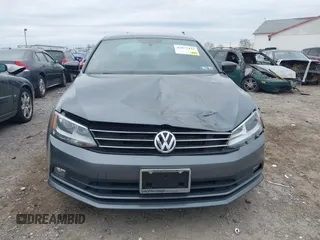 2016 Volkswagen Jetta Sport z VIN 3VWD17AJ2GM399335, wystawiony jako IAAI lot #42077435 z przebiegiem 92 284 mil mil oraz . Historia ofert i sprzedaży dostępna na DreamBid. Obrazek 12.