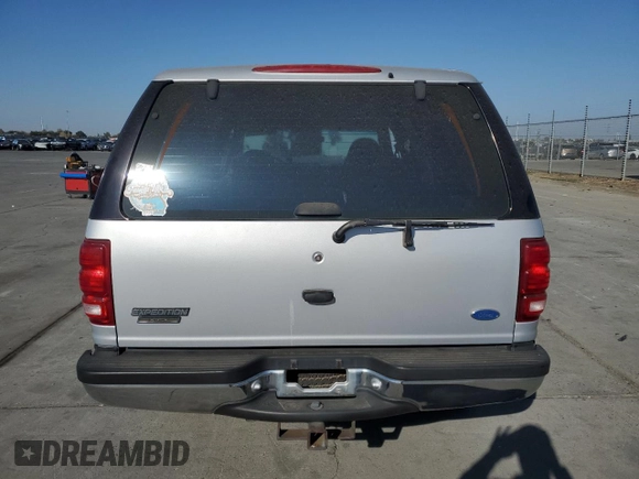1997 Ford Expedition XLT z VIN 1FMEU1768VLA49281, wystawiony jako Copart lot #79895244 z przebiegiem 73 188 mil mil oraz Szkoda całkowita • Salvage title. Historia ofert i sprzedaży dostępna na DreamBid. Obrazek 6.
