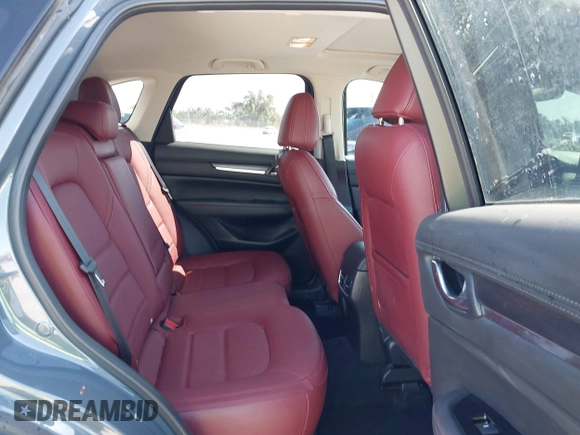 2021 Mazda CX-5 Touring with VIN JM3KFACM1M0317763, listed as a IAAI auction lot 41775712 with 75,068 mi miles. Bid and sale history available at carsss.com. Image 8.