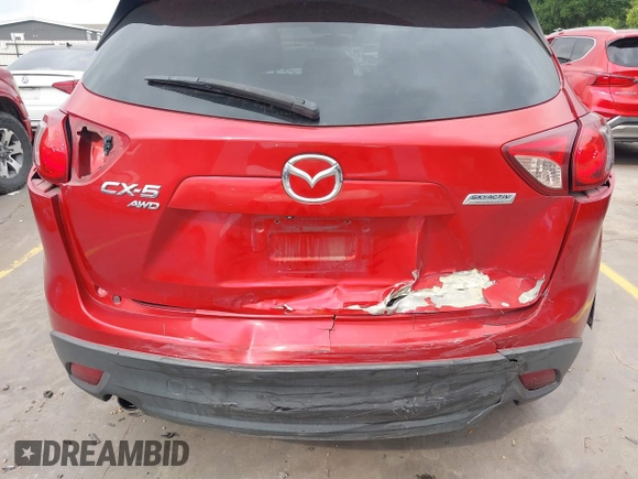 2015 Mazda CX-5 Touring with VIN JM3KE4CYXF0439953, listed as a IAAI auction lot 42124197 with 242,614 mi miles and . Bid and sale history available at DreamBid. Image 6.