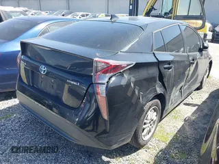 2017 Toyota Prius Two z VIN JTDKBRFU1H3047596, wystawiony jako IAAI lot #41868277 z przebiegiem 160 824 mil mil oraz . Historia ofert i sprzedaży dostępna na DreamBid. Obrazek 4.
