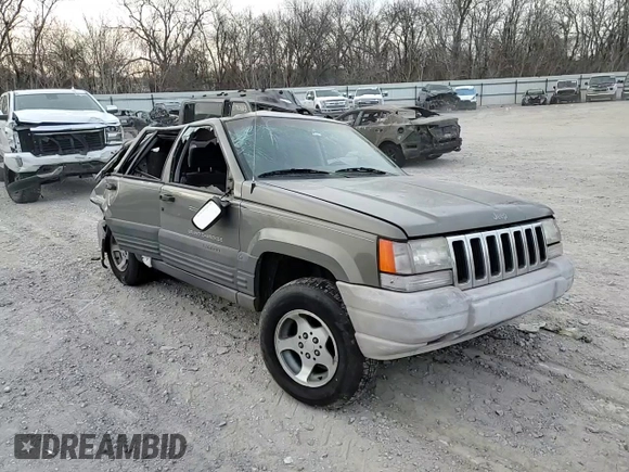1996 Jeep Grand Cherokee Laredo with VIN 1J4FX58S0TC190128, listed as a Copart auction lot 42830345 with 0 mi miles and Salvage Title. Bid and sale history available at carsss.com. Image 12.