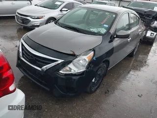2015 Nissan Versa SV with VIN 3N1CN7AP0FL881056, listed as a IAAI auction lot 42106423 with 134,760 mi miles. Bid and sale history available at carsss.com. Image 2.