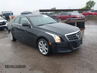 2014 Cadillac ATS Standard RWD with VIN 1G6AA5RX7E0112352, listed as a IAAI auction lot 42487515 with 98,009 mi miles and . Bid and sale history available at DreamBid. Image 1.