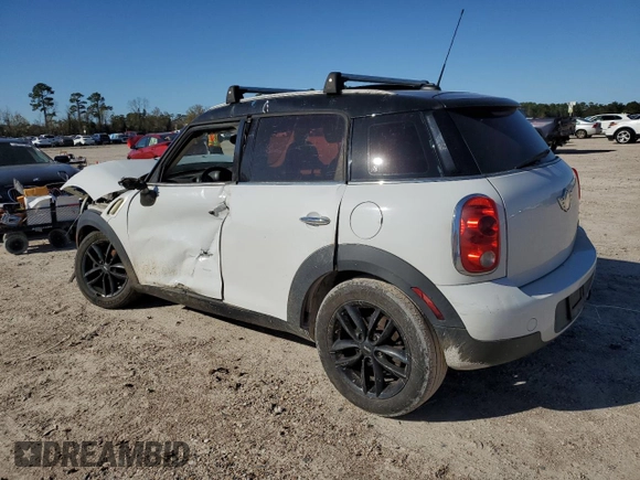 2011 MINI Countryman with VIN WMWZB3C59BWH94541, listed as a Copart auction lot 87177514 with 186,979 mi miles and Salvage title. Bid and sale history available at DreamBid. Image 2.