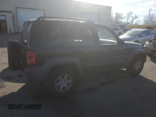 2003 Jeep Liberty Sport with VIN 1J4GK48KX3W658457, listed as a Copart auction lot 41863855 with 194,747 mi miles and Salvage Title. Bid and sale history available at DreamBid. Image 3.