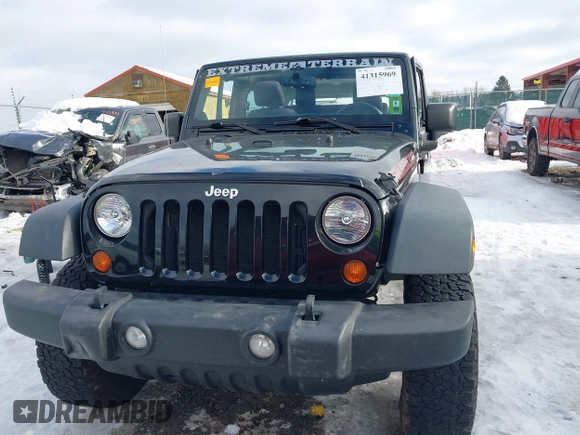 2013 Jeep Wrangler Rubicon 10th Anniversary with VIN 1C4BJWCG3DL591186, listed as a IAAI auction lot 41315969 with 54,984 mi miles and . Bid and sale history available at DreamBid. Image 13.