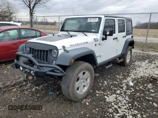 2014 Jeep Wrangler Unlimited Rubicon with VIN 1C4BJWFG9EL150370, listed as a Copart auction lot 49917075 with 110,756 mi miles and Salvage title. Bid and sale history available at DreamBid. Image 1.
