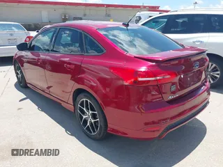 2016 Ford Focus SE z VIN 1FADP3F28GL237888, wystawiony jako IAAI lot #42564140 z przebiegiem 143 210 mil mil oraz . Historia ofert i sprzedaży dostępna na DreamBid. Obrazek 3.